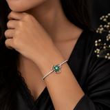 Silver AD Diamond Bracelet with Emerald Floral Motif
