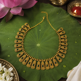 Antique Gold Finish Temple Necklace Set with Green Stones & Jhumka Earrings
