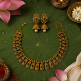 Antique Gold Finish Temple Necklace Set with Green Stones & Jhumka Earrings
