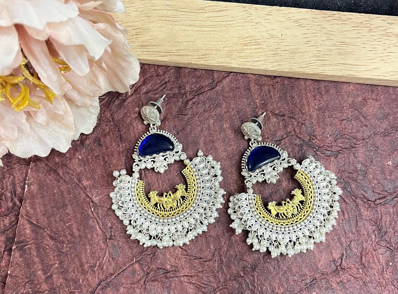 Blue stone studded dual tone chandbali earrings
