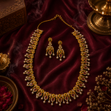 Traditional Gold Polish Long Temple Necklace Set with Ruby, Emerald & Pearl Detailing