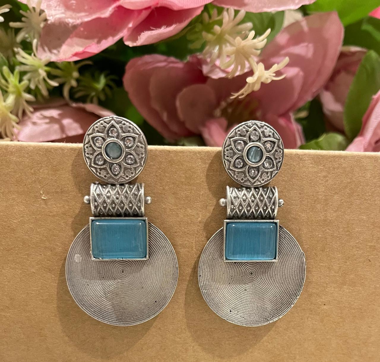 Silver replica earrings