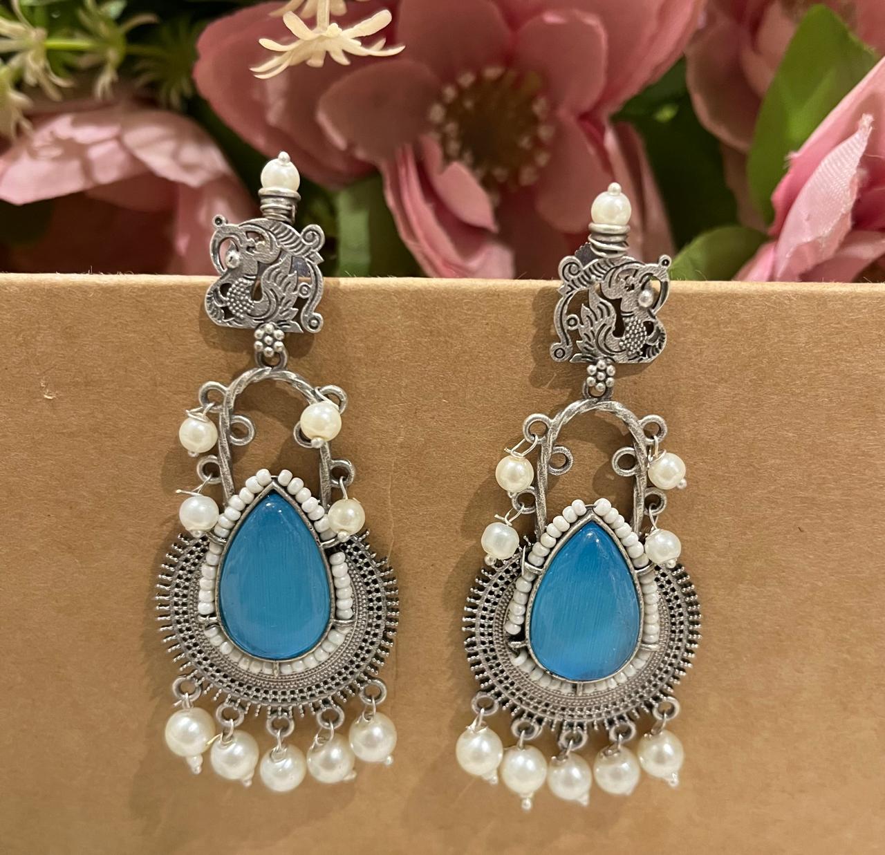 Silver replica earrings