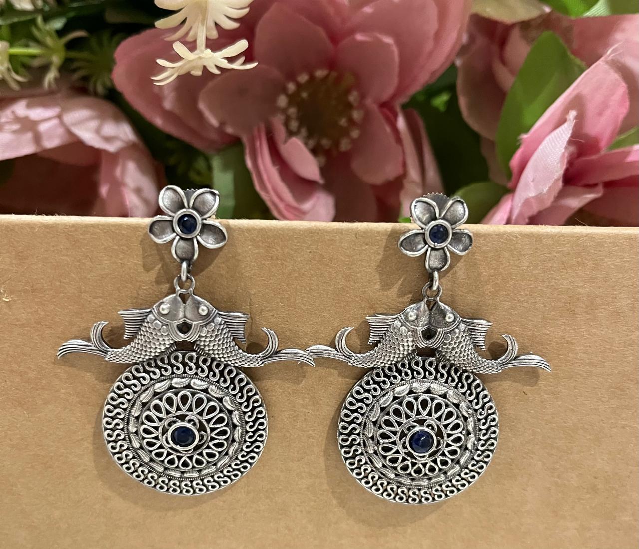 Silver replica earrings