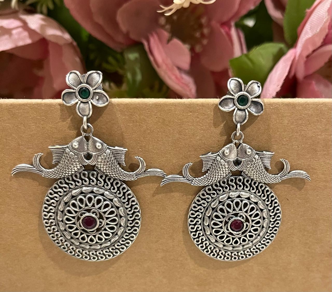Silver replica earrings