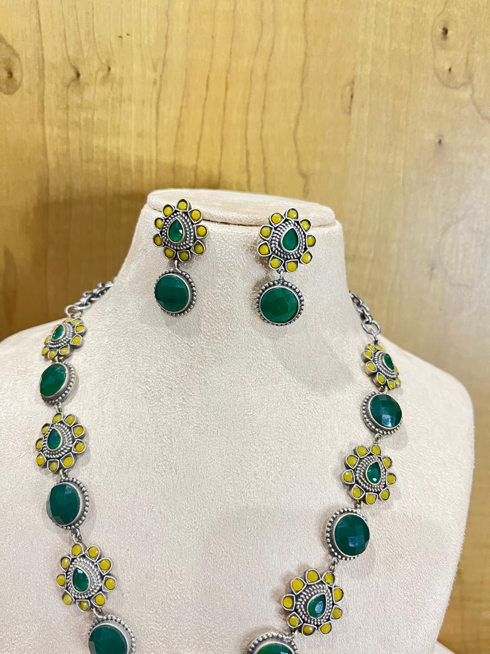 Silver replica stone studded necklace