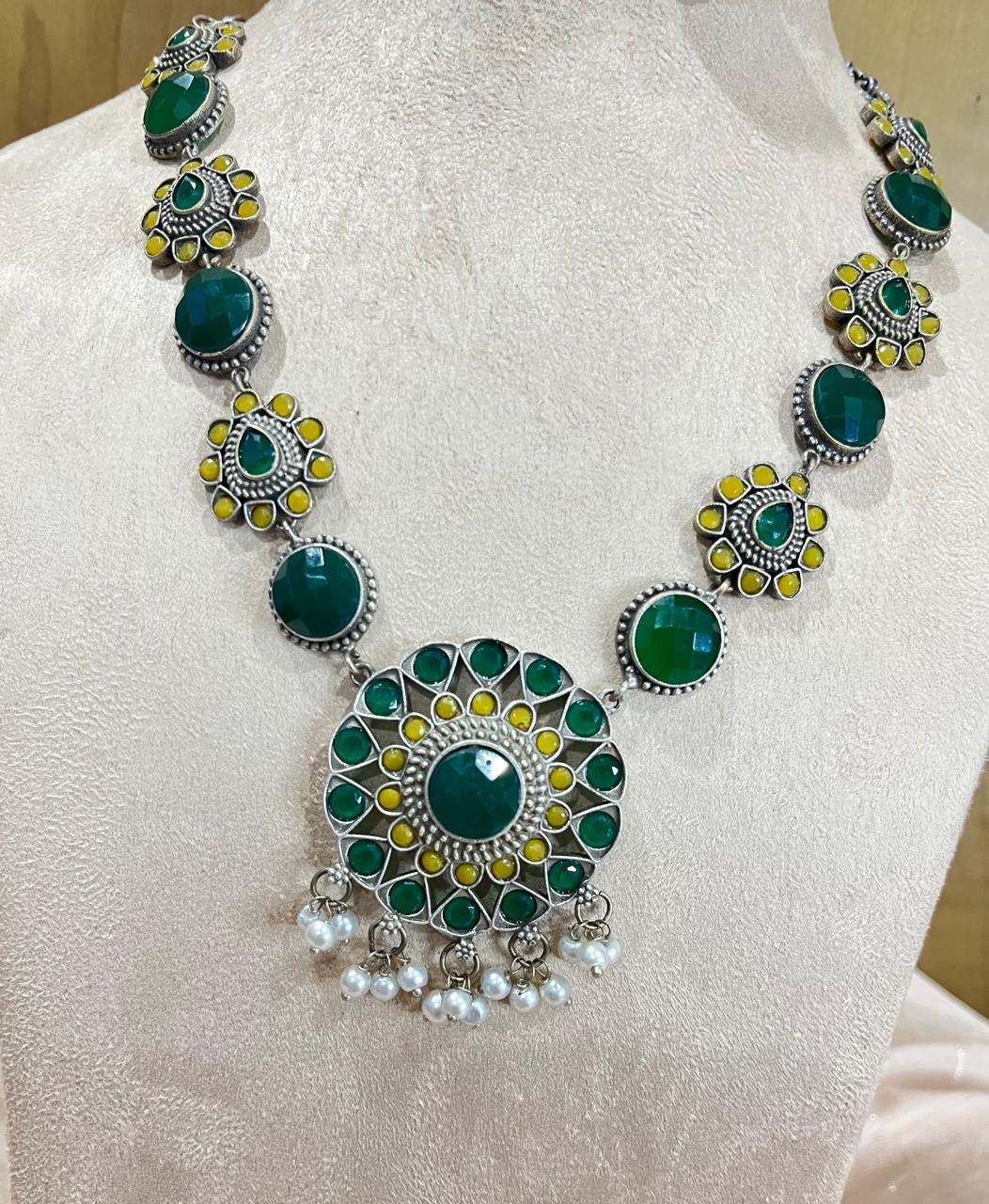 Silver replica stone studded necklace