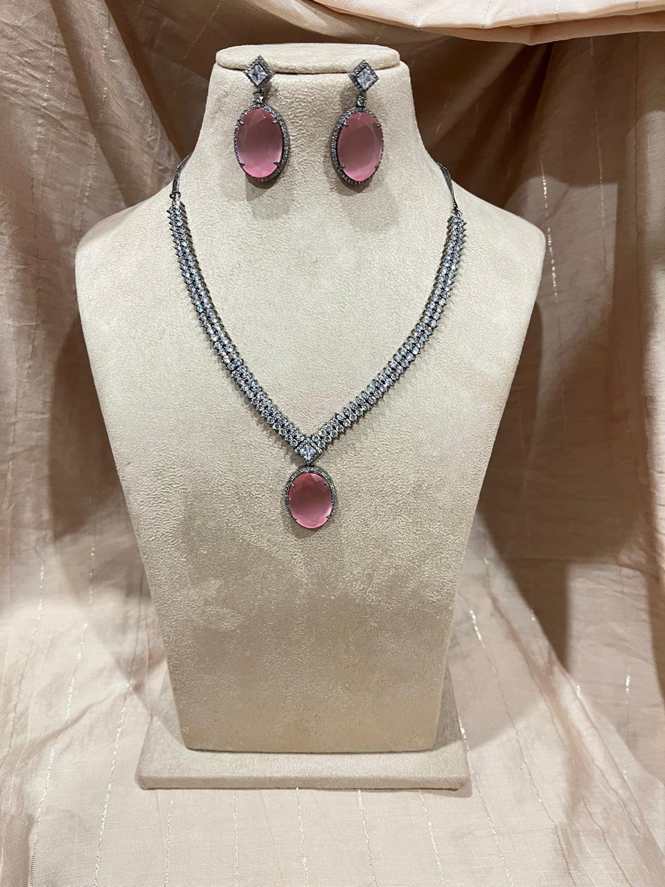Baby pink Ad Diamond necklace with earrings