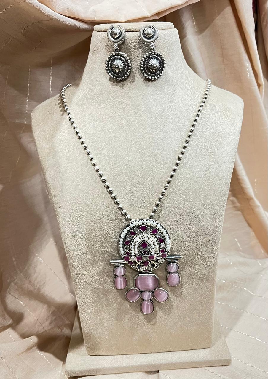 Silver replica stone studded pendant with chain necklace with earrings