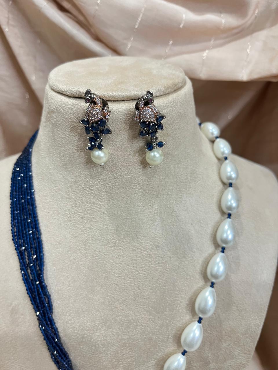 Blue Ad diamond pendant with blue crystal beads and pearl necklace