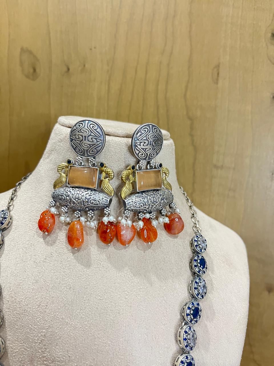 Dual tone stone studded long necklace with earrings