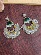 Green stone studded dual tone chandbali earrings