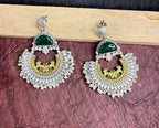 Green stone studded dual tone chandbali earrings