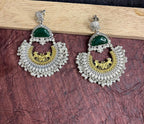 Green stone studded dual tone chandbali earrings