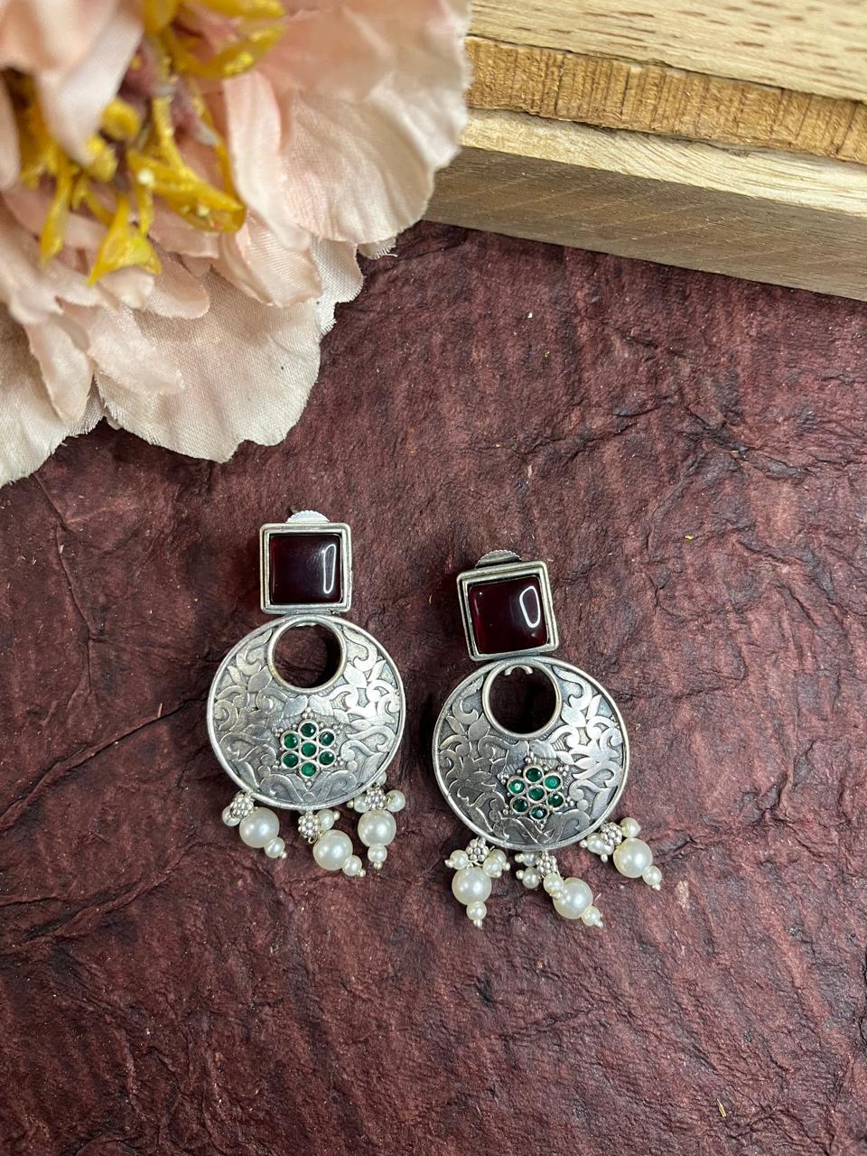 Stone studded silver replica earrings