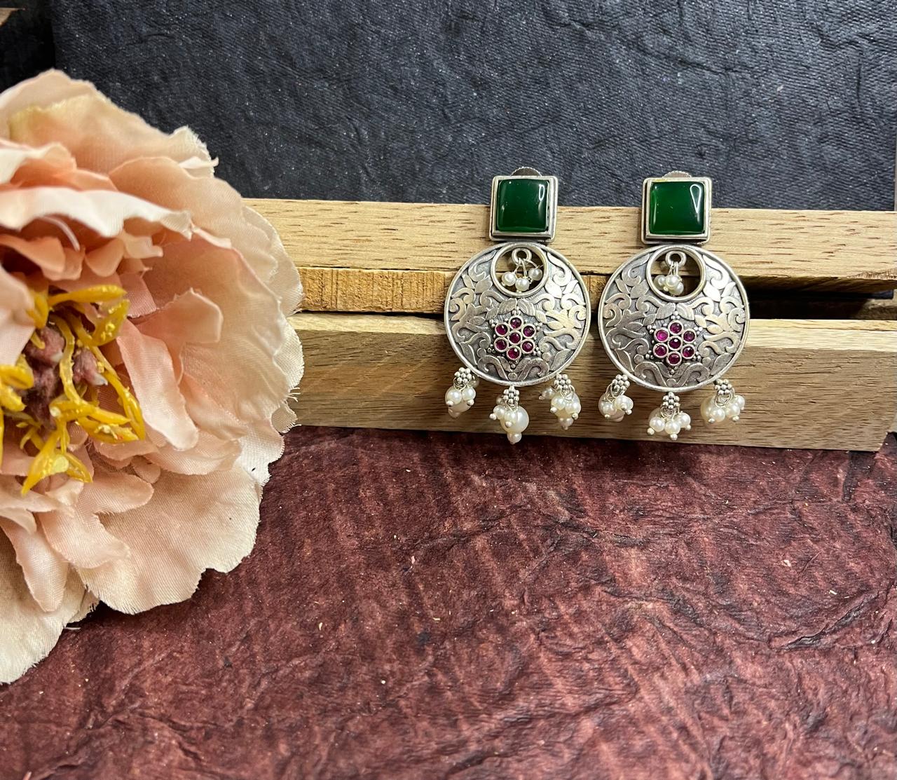 Silver replica stone studded earrings