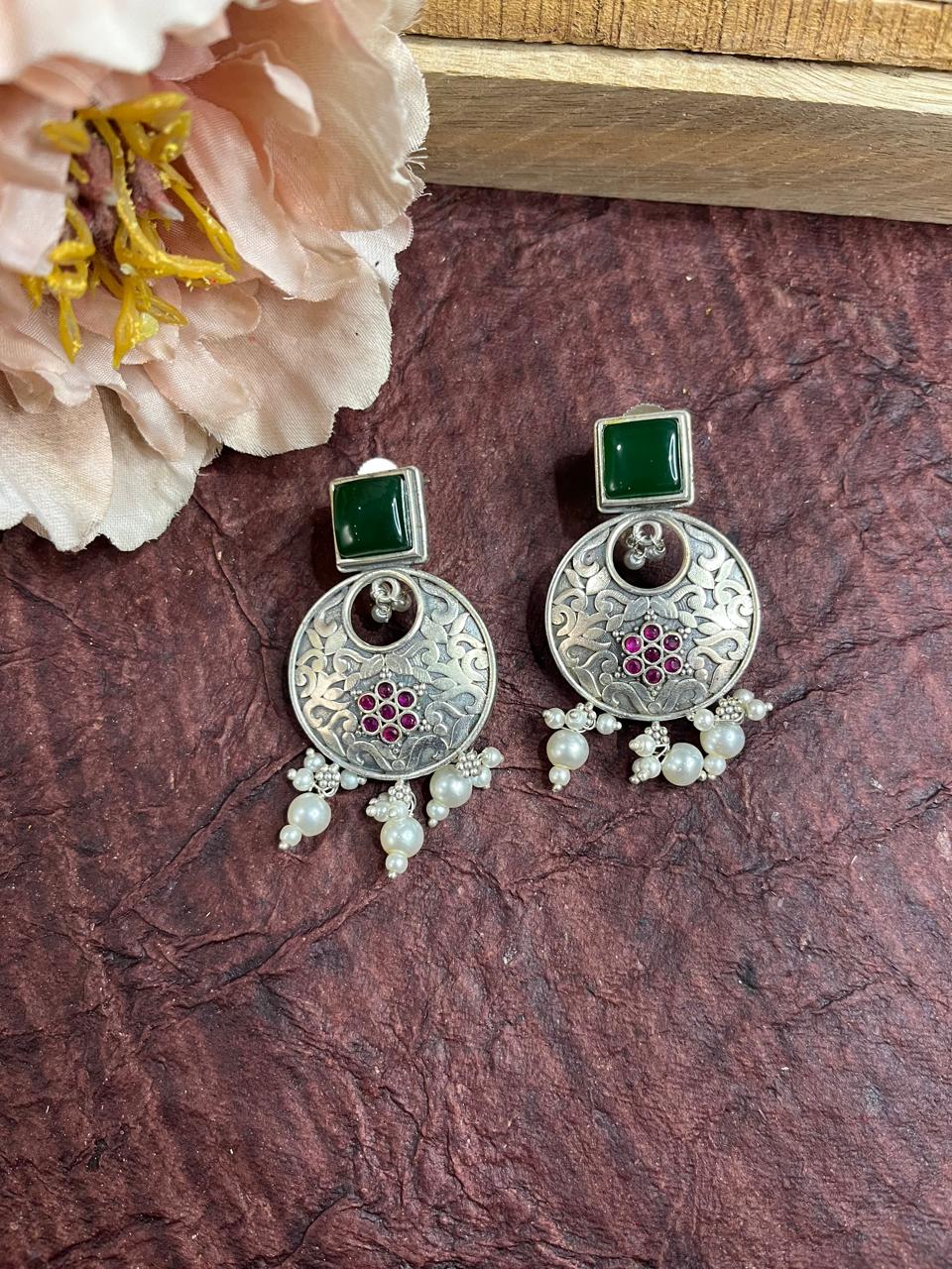 Silver replica stone studded earrings