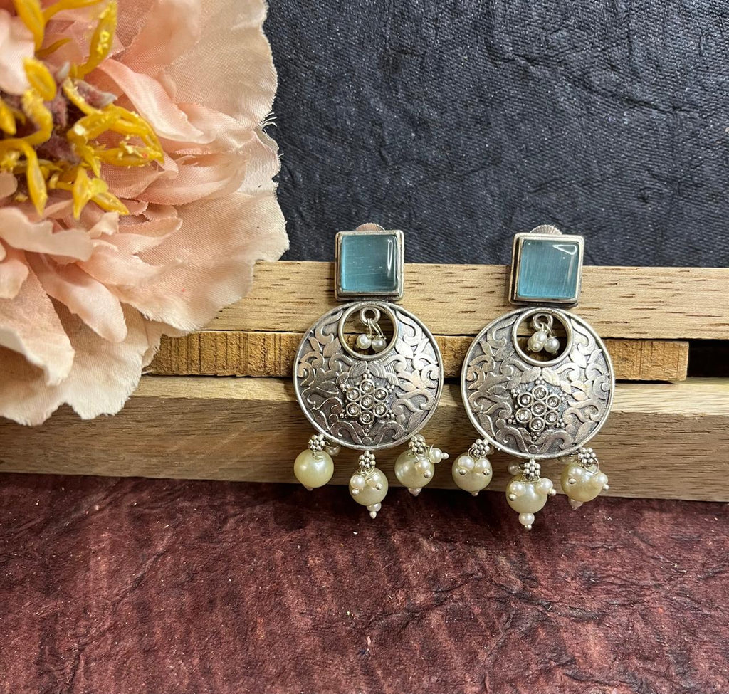 Silver replica stone studded earrings