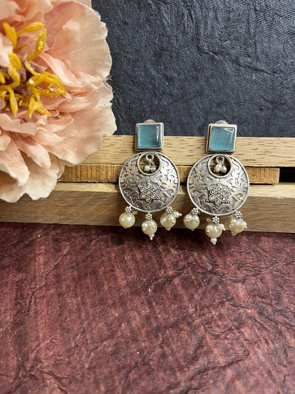 Silver replica stone studded earrings