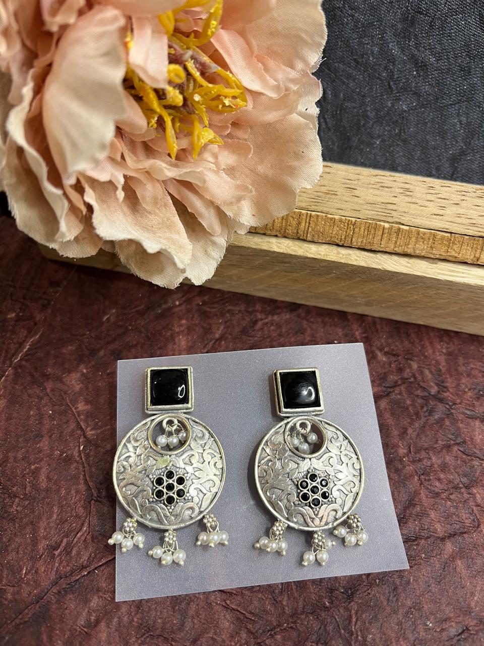 Silver replica stone studded earrings
