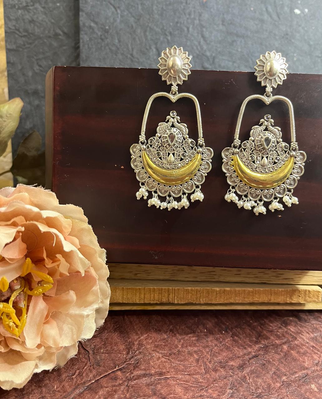 Dual tone chandbali stone studded earrings