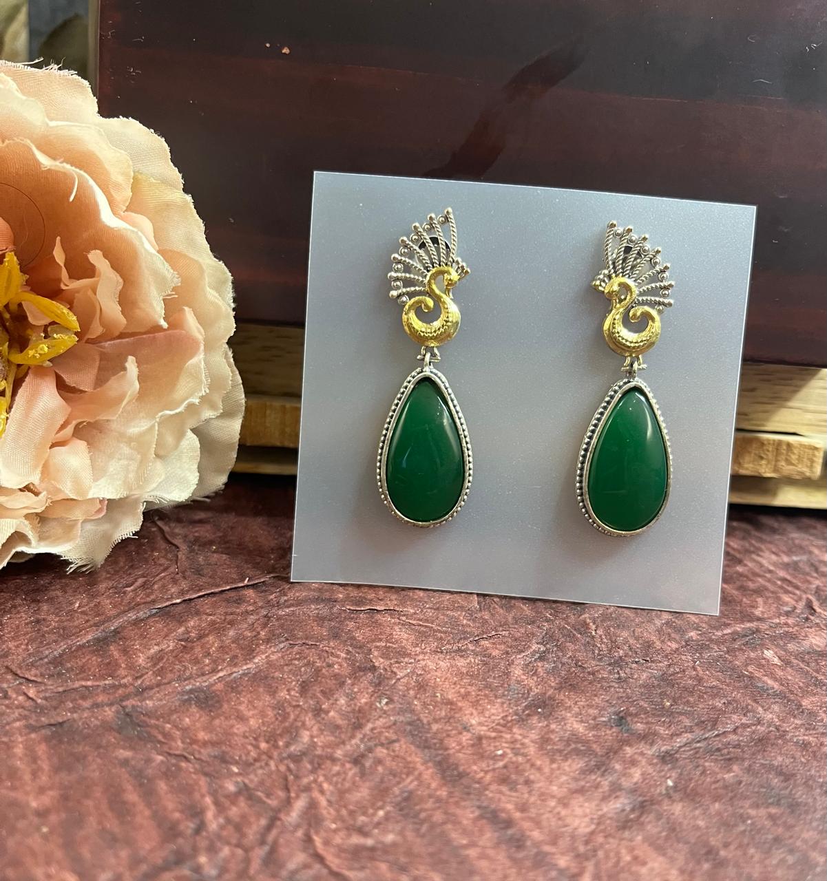 Stone studded dual tone earrings