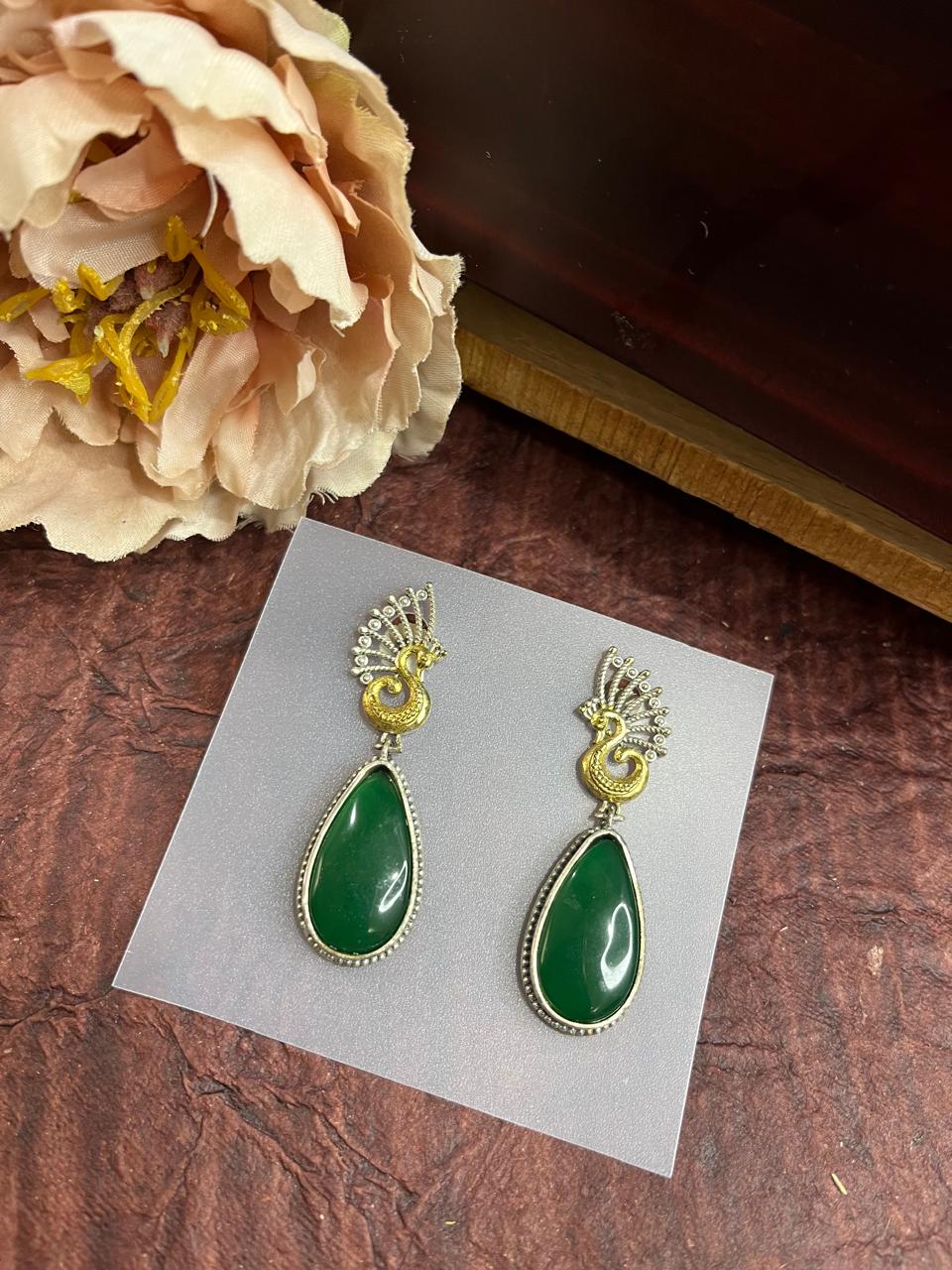 Stone studded dual tone earrings