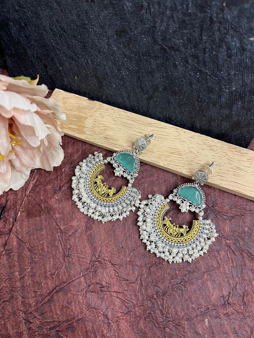 Dual tone stone studded chandbali earrings