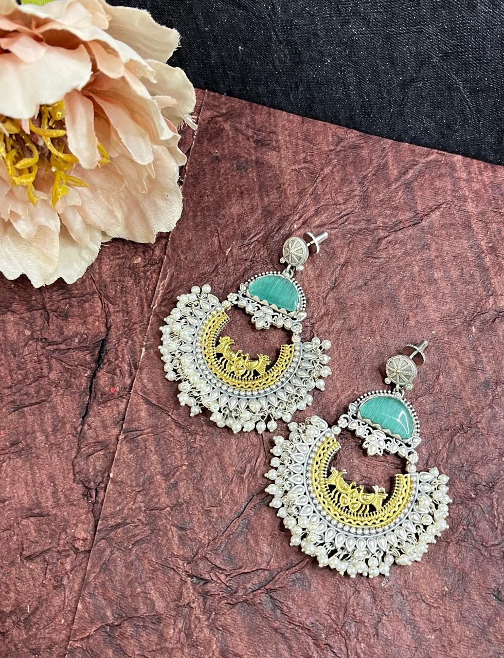 Dual tone stone studded chandbali earrings