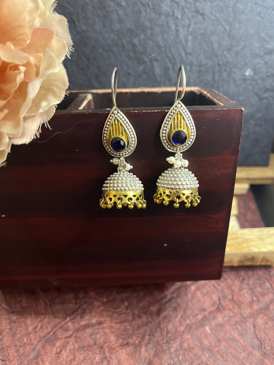 Dual tone blue stone studded jhumkha latkan earrings