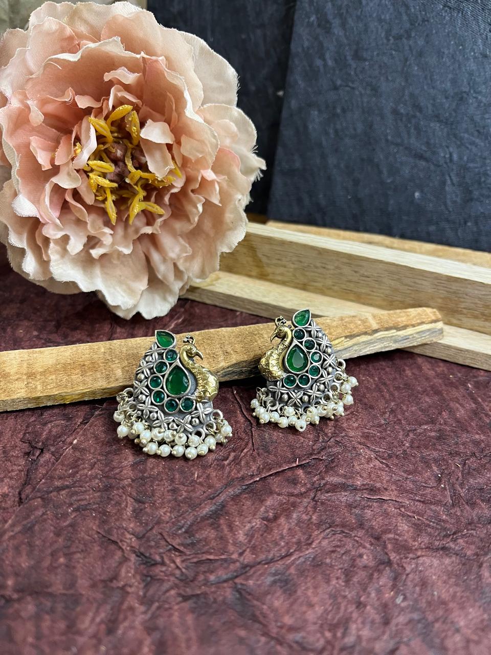 Green stone studded peacock studs