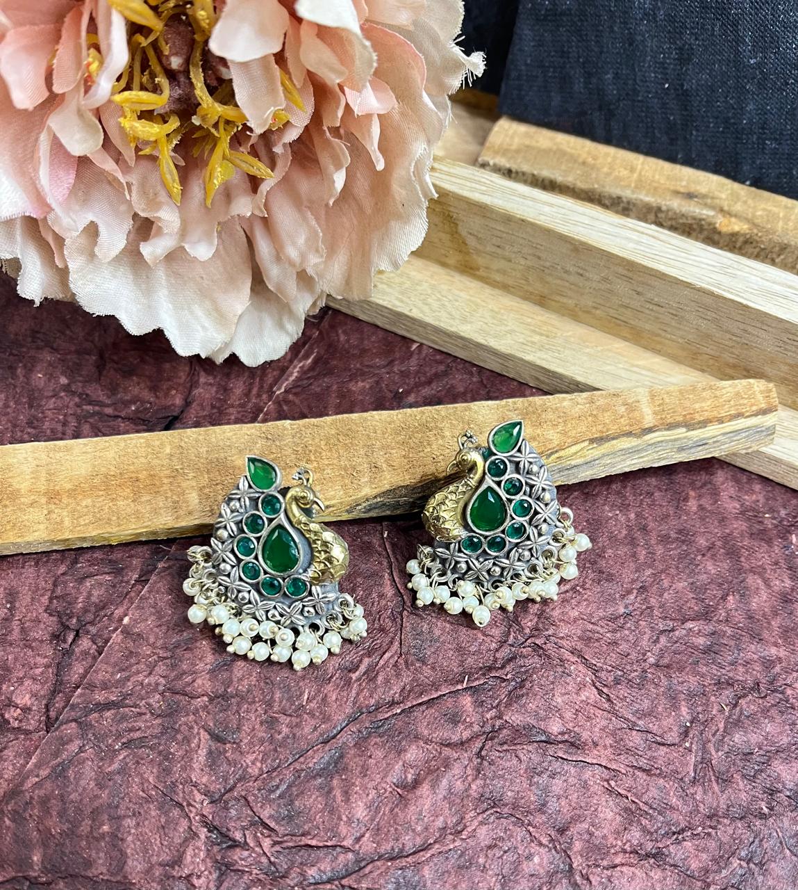 Green stone studded peacock studs