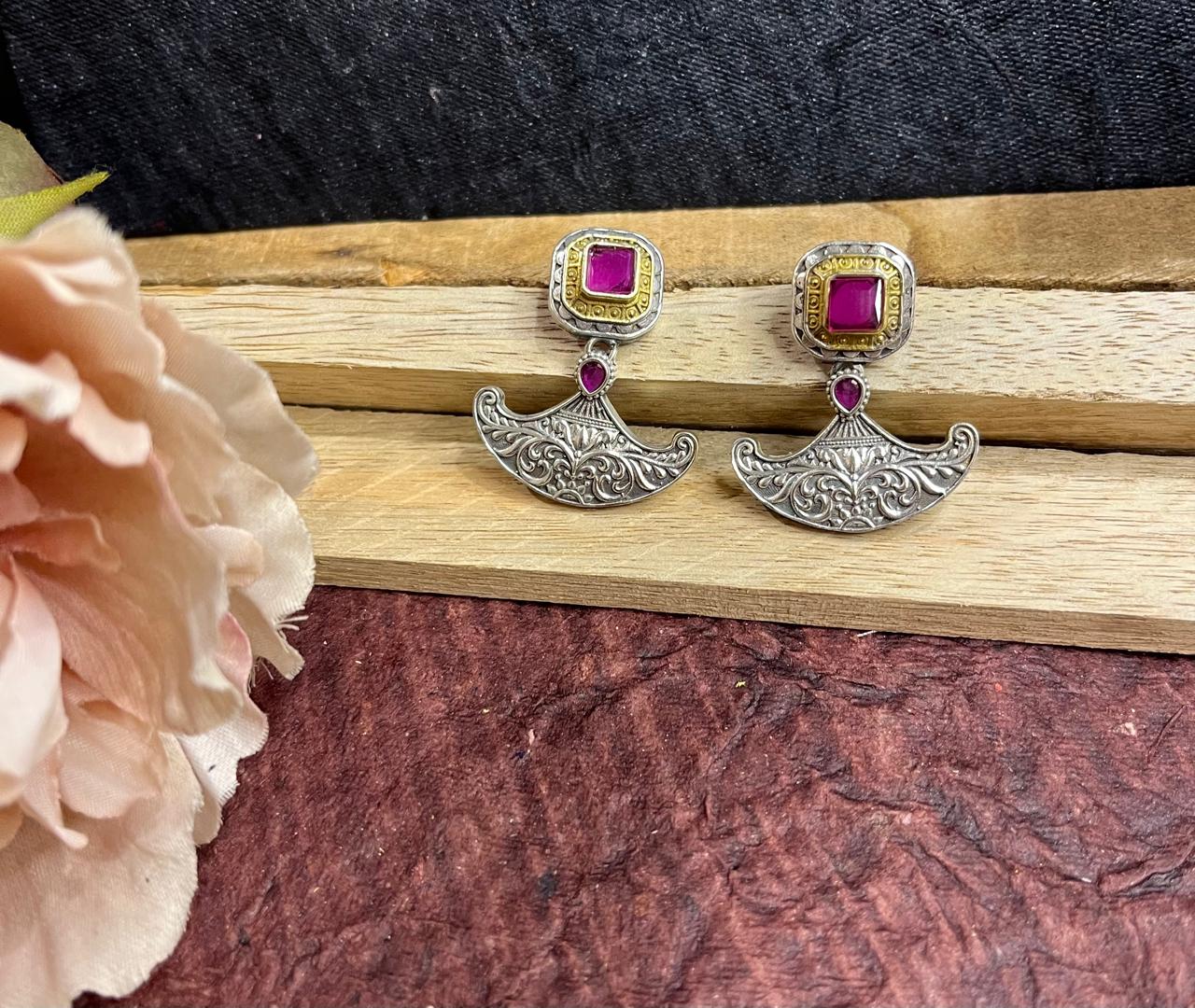 Dual tone stone studded tops earrings
