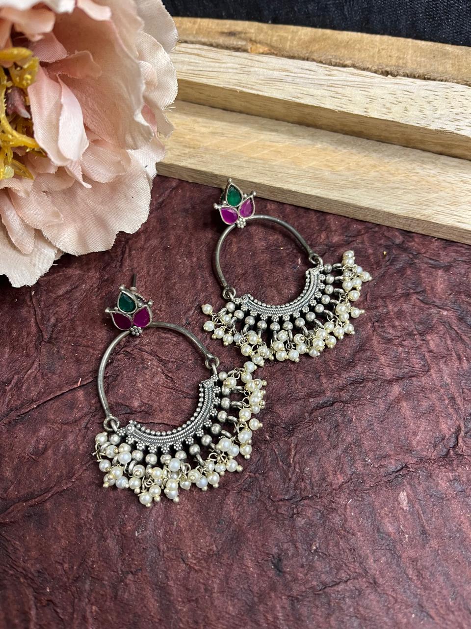Stone studded long earrings