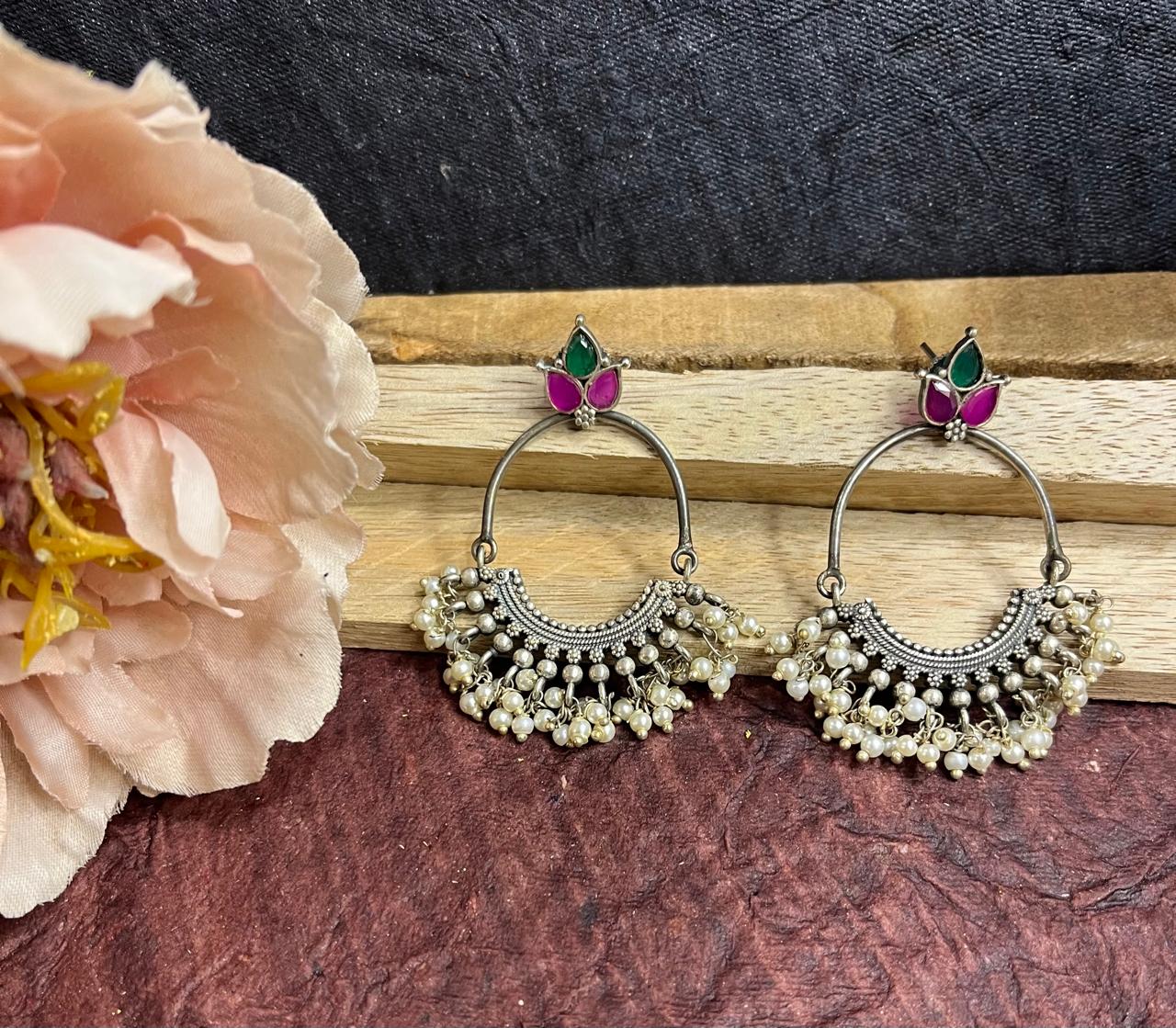 Stone studded long earrings