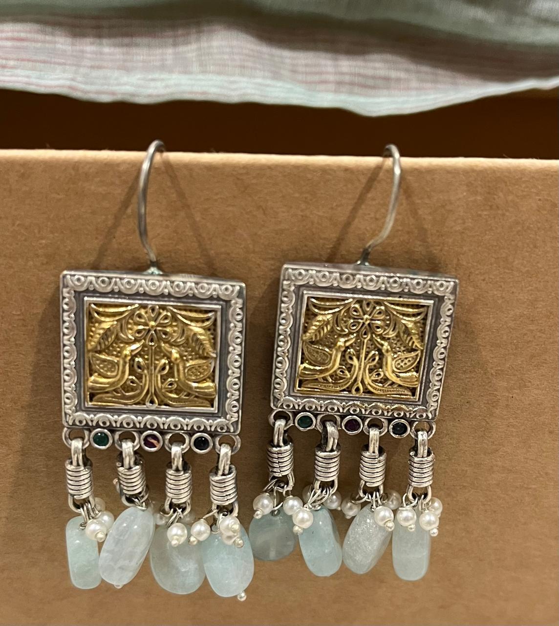 Dual tone hang earrings with beads