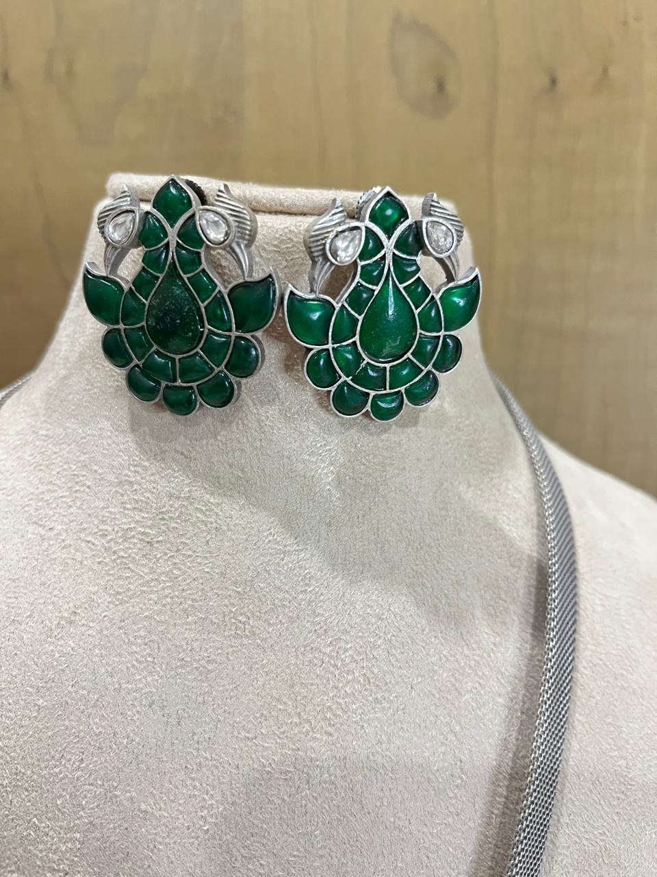 Silver replica stone studded pendant necklace with earrings