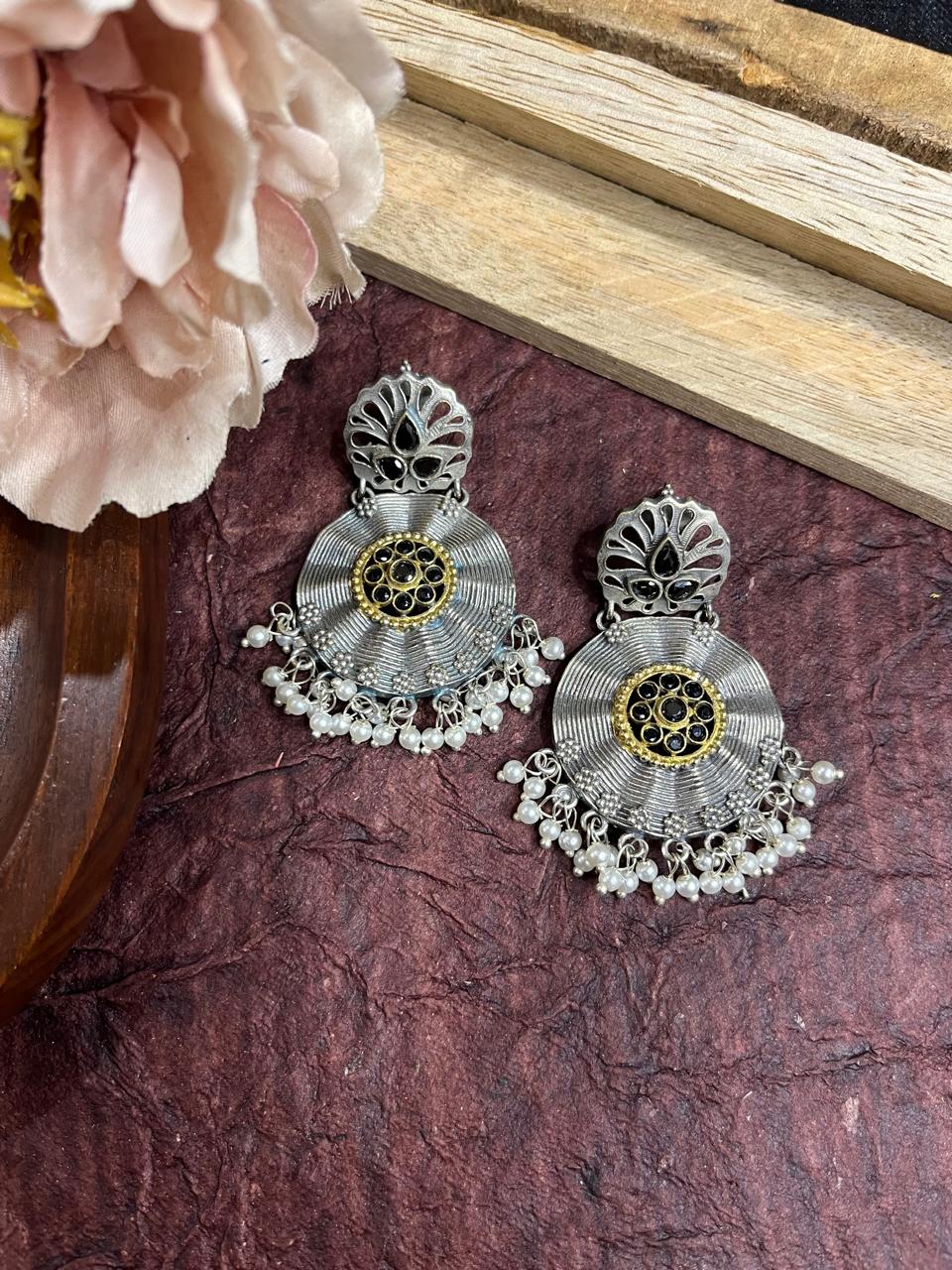 Dual tone stone studded earrings